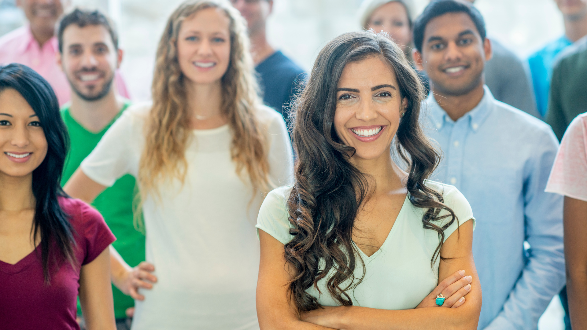 Diverse community of people smiling together